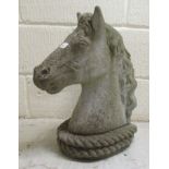 A composition stone horse's head  19"h