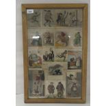 A collage of sixteen late Victorian, humourous coloured prints  13" x 21"  framed