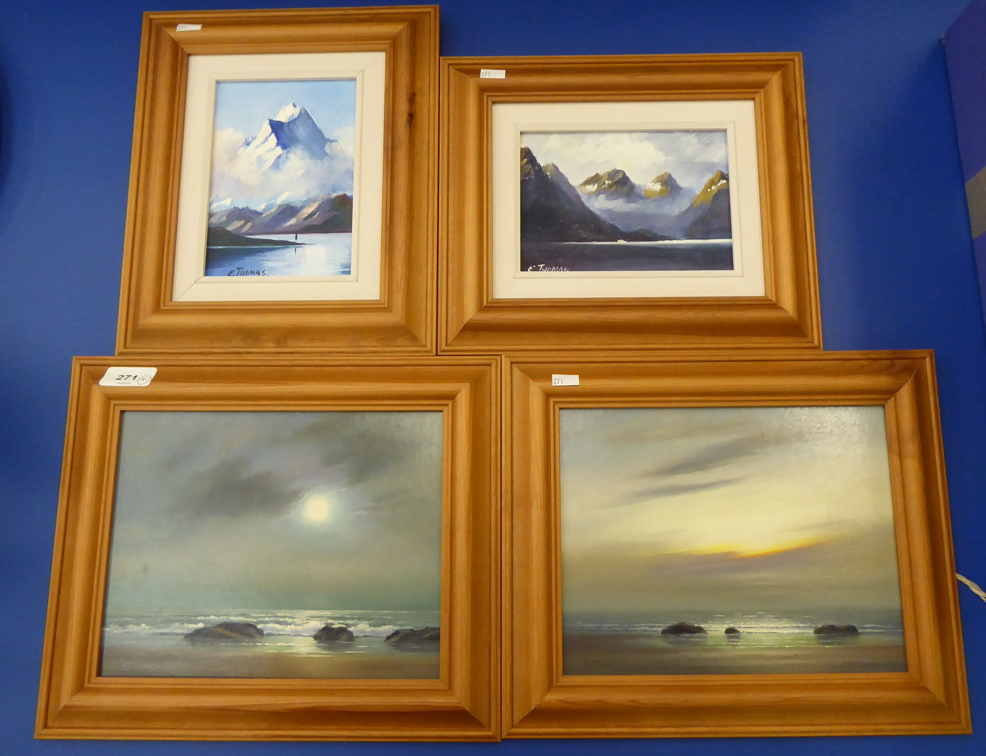 Two works by E Thomas - mountainous landscapes  oil on board  bearing signatures  5" x 6.5"  framed;