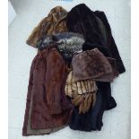 Various items of fur: to include a white Canadian hat; and a black mink, three-quarter length coat