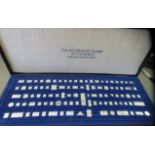 A Sterling silver miniature collection of 'The 100 Greatest Stamps of the World'  one missing  cased