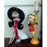 A Danbury Mint composition Betty Boop figure  29"h; and another standing beside a lamppost  33"h