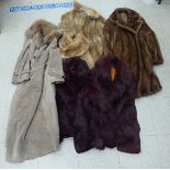 Various items of fur: to include a grey suede full length coat; and a mid brown mink three-quarter