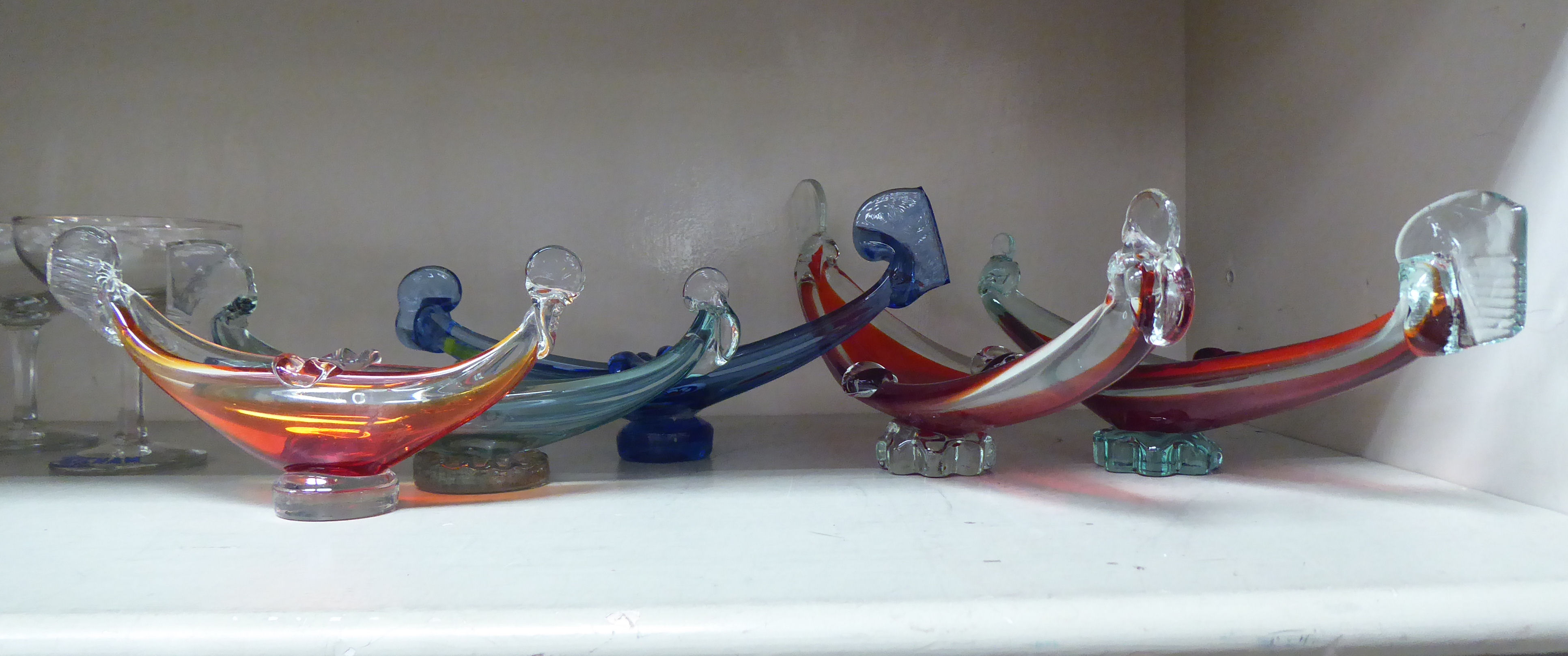 Five similar Murano coloured glass, gondola shape ornaments: to include red and blue examples  8"-