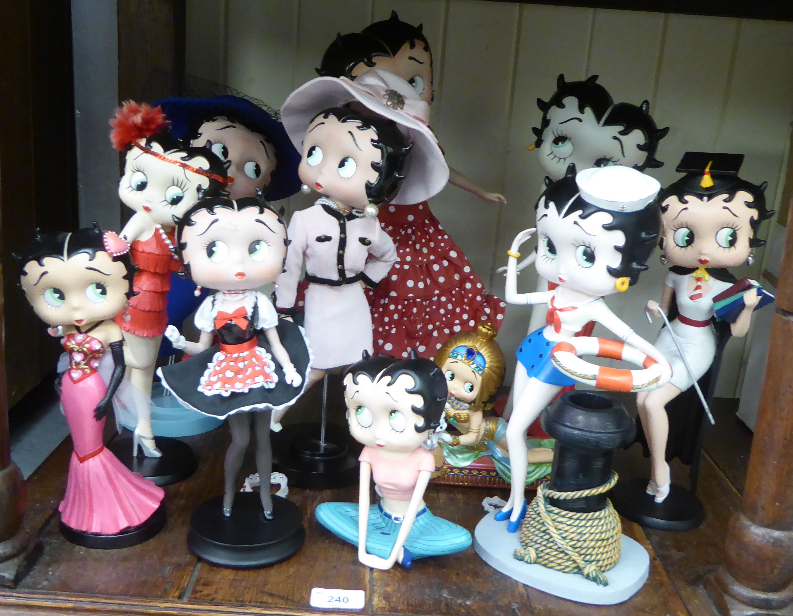 Betty Boop porcelain and composition figures, wearing various costumes  6"-12"h