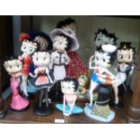 Betty Boop porcelain and composition figures, wearing various costumes  6"-12"h