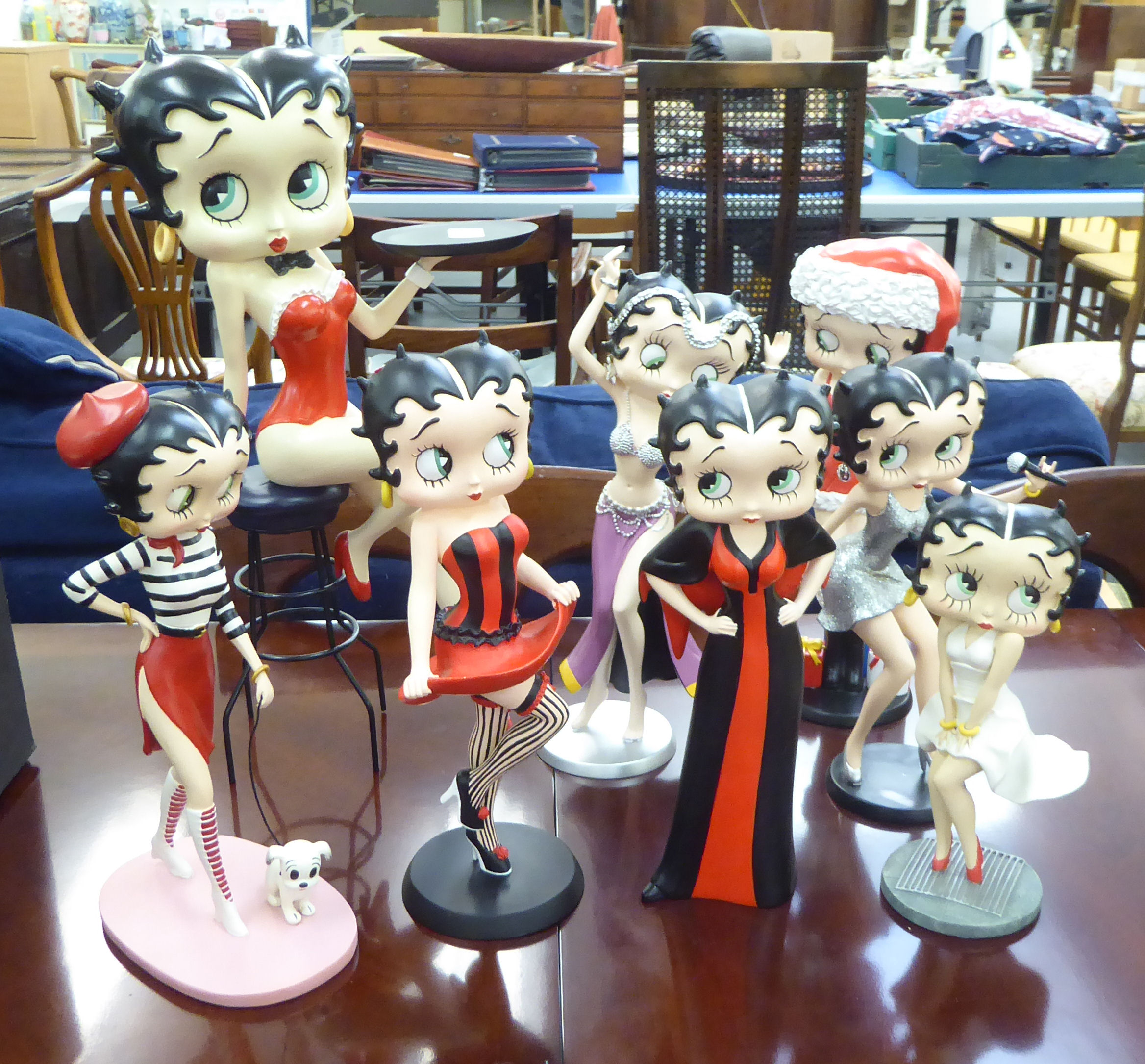 Betty Boop porcelain figures, wearing various costumes  9"-17"h