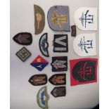 Approx. fifteen cloth military arm badges: to include SAS (Please Note: this lot is subject to the