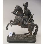 A late 19thC bronze finished spelter model, a Medieval knight in full armour, on horseback  13"h