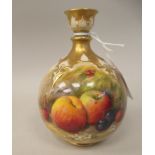 A Royal Worcester ivory glazed and gilded spherical vase, having a narrow neck and cup lip,