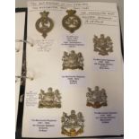 An album collection of fully identified British military badges, some copies, comprising