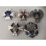 Five various Polish enamelled breast badges (Please Note: this lot is subject to the statement