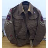 A 1942 dated British Parachute Regiment battledress top and trousers (Please Note: this lot is