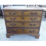 An early 19thC mahogany dressing chest with four long drawers, raised on bracket feet  28"h  32"w