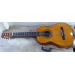 A BM Classico of Spain six string accoustic guitar