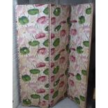 A mid 20thC floral fabric upholstered three fold room screen  67"h  54"w open