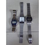 Three vintage stainless steel cased and strapped digital display watches, viz. a Sanyo; a Timex