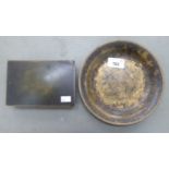 A bronze plate by Just Anderson of Denmark  7.25"dia; and a metal cigarette box  5.5"w