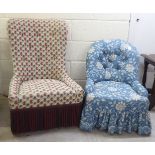 Two modern fabric upholstered nursing chairs, raised on turned mahogany legs