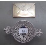 A George V silver envelope design card case  Birmingham 1910; and a foliate cast pierced shallow