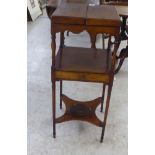 A Regency satinwood inlaid mahogany washstand with a double foldover top and a drawer, raised on