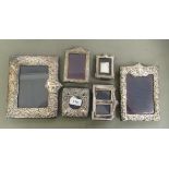 Six silver photograph frames  various styles and sizes  mixed marks