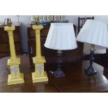 Interior designer accessoires: to include a pair of yellow painted softwood column design table