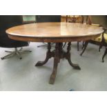 A late Victorian walnut breakfast table, the oval, quarter veneered tip top with marquetry ornament,