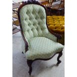 A mid 19thC rosewood framed salon chair with a button upholstered green fabric back and seat, raised