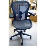 A modern Herman Miller Aeron office chair  size B