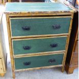 An early 20thC bamboo framed three drawer dressing chest with embossed, green painted panels and