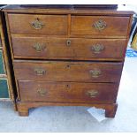 A George III oak five drawer dressing chest, raised on bracket feet  36"h  34"w