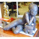 A modern bronzed finished cast metal figure, a reclining nude  14"h  26"L