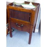 A George III mahogany night commode, the tray design top with galleried, cut-out handles, over a