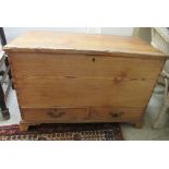 A late Victorian pine blanket chest with a hinged lid, raised on bracket feet  24"h  35"w