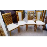 Two dissimilar pairs of light oak framed dining chairs