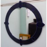 A modern plaster, glazed ceramic effect framed mirror  34"dia