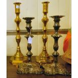A pair of 20thC lacquered brass candlesticks  22"h; and a pair of contemporary silver plated