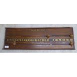 An early 20thC Henning Bros mahogany snooker score board