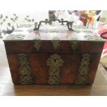 A late 19thC figured walnut veneered jewellery casket with ornately pierced and rivetted, overlaid
