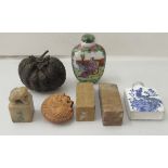 Oriental collectables: to include two dissimilar Chinese china snuff bottles; and two carved stone