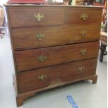 An early 20thC mahogany dressing chest with two short/three graduated long drawers, brass bail