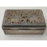 A 19thC Oriental silver snuff box of rectangular form with a gilded interior, the hinged lid set