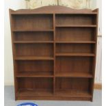A modern oak bookcase with two banks of five shelves, on a plinth  47"h  44"w