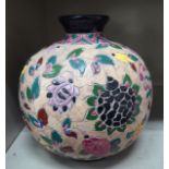 An AJ Massier, Vallauns stoneware spherical vase, decorated in colours with flora and foliage  bears