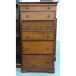 A modern mahogany finished dressing chest with an arrangement of six drawers, on a plinth  48"h