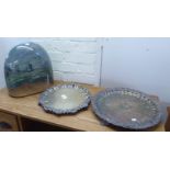 Two late Victorian silver plated serving trays  14"dia; and a clear glass display dome, reverse
