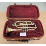 An Earlham gilt finished trumpet, in a fitted carrying case