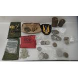 A mixed lot: to include uncollated coins; embroidered and other military badges