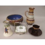 Six items of Doulton ceramics: to include a Lambeth Stoneware jug with stiff leaf and other